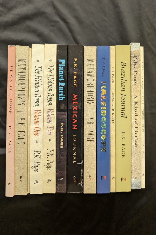 Stack of books by P.K. Page on a dark fabric background